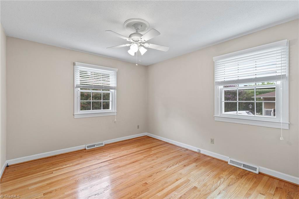 1610 Bolingbroke Road High Point, NC 27265 - Photo 17 of 24 Front corner Third bedroom
