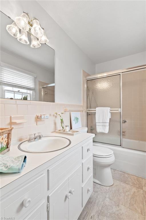 1610 Bolingbroke Road High Point, NC 27265 - Photo 20 of 24 Guest bath for bedrooms 3 & 4. Ceramic bathtub/shower combo