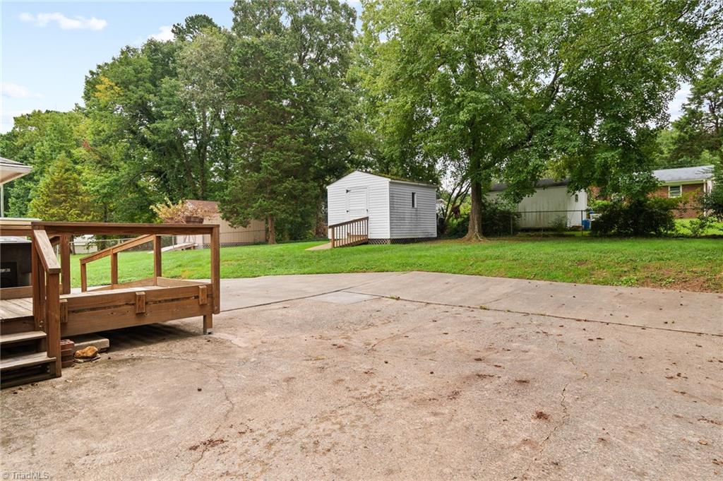 1610 Bolingbroke Road High Point, NC 27265 - Photo 23 of 24 LARGE Paved Pad for parking and storage building in the distance remains