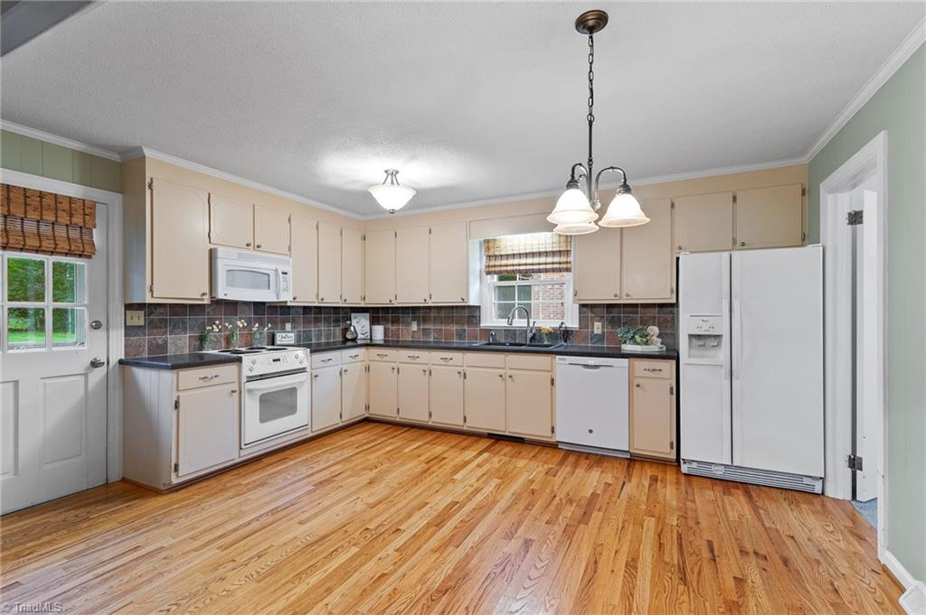 1610 Bolingbroke Road High Point, NC 27265 - Photo 6 of 24 LOTS of cabinet space! Updated appliances that remain, gorgeous REAL HARDWOODS!