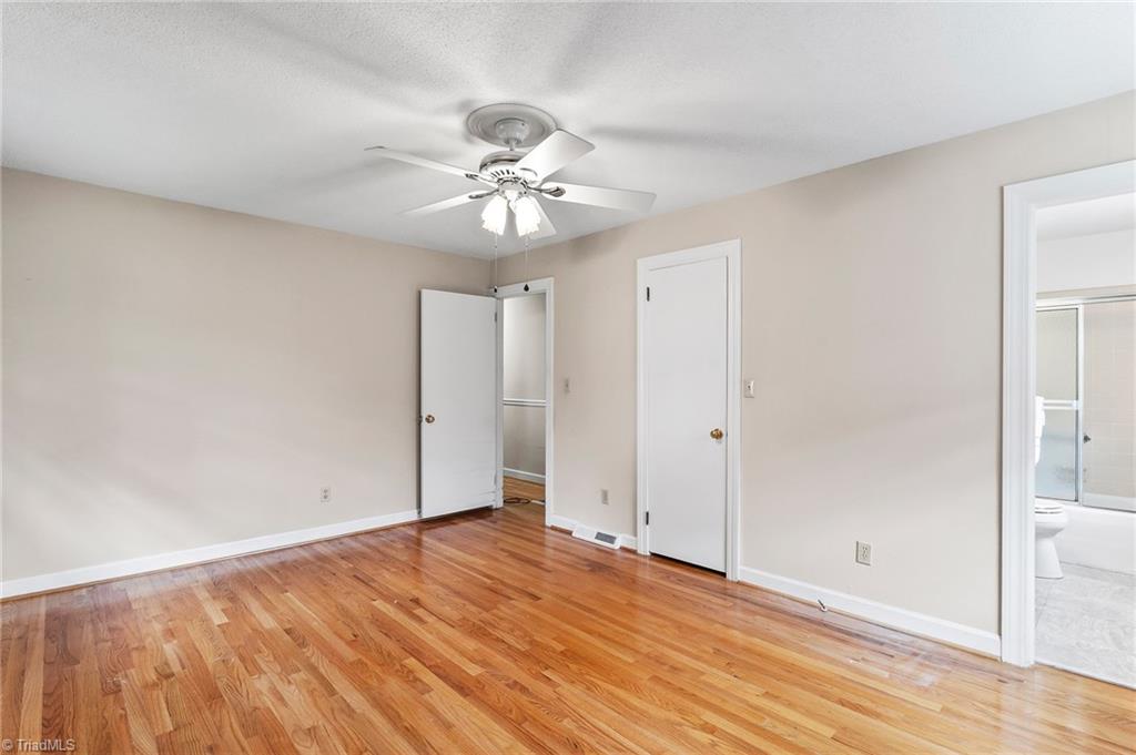 1610 Bolingbroke Road High Point, NC 27265 - Photo 10 of 24 Master bedroom with full bath in the distant right.