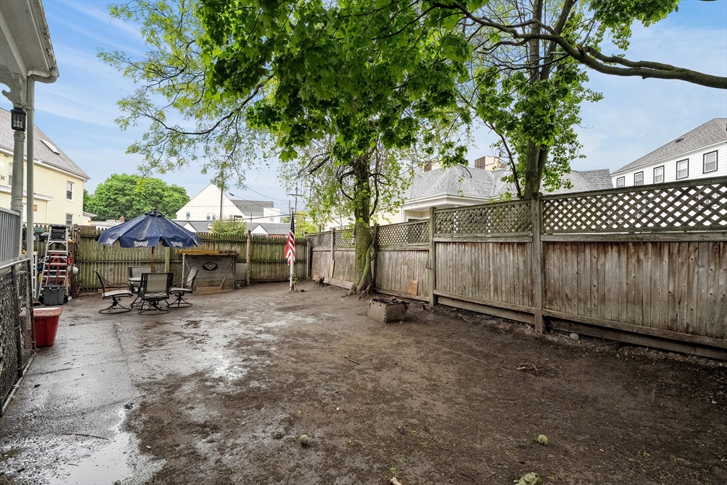 15 Guild Street Quincy, MA 02169 - Photo 40 of 42 a view of a backyard with a tree
