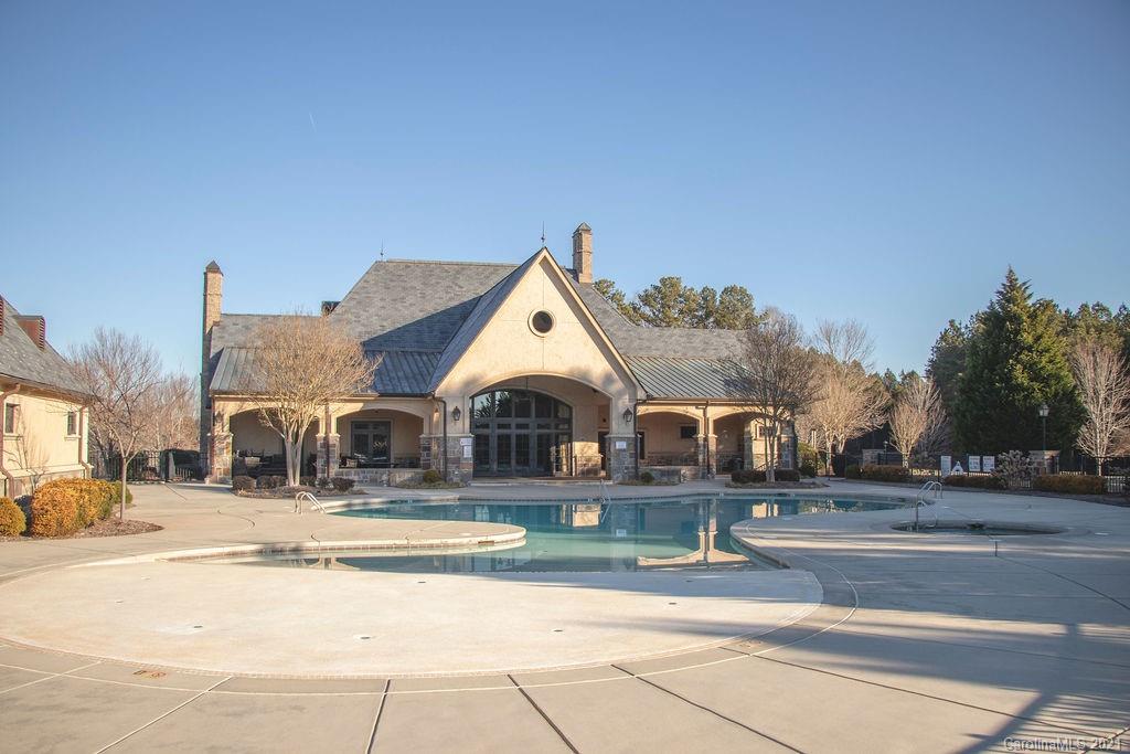 1105 Reflection Pointe Boulevard, Unit 13 Belmont, NC 28012 - Photo 23 of 25 a view of a building with a street