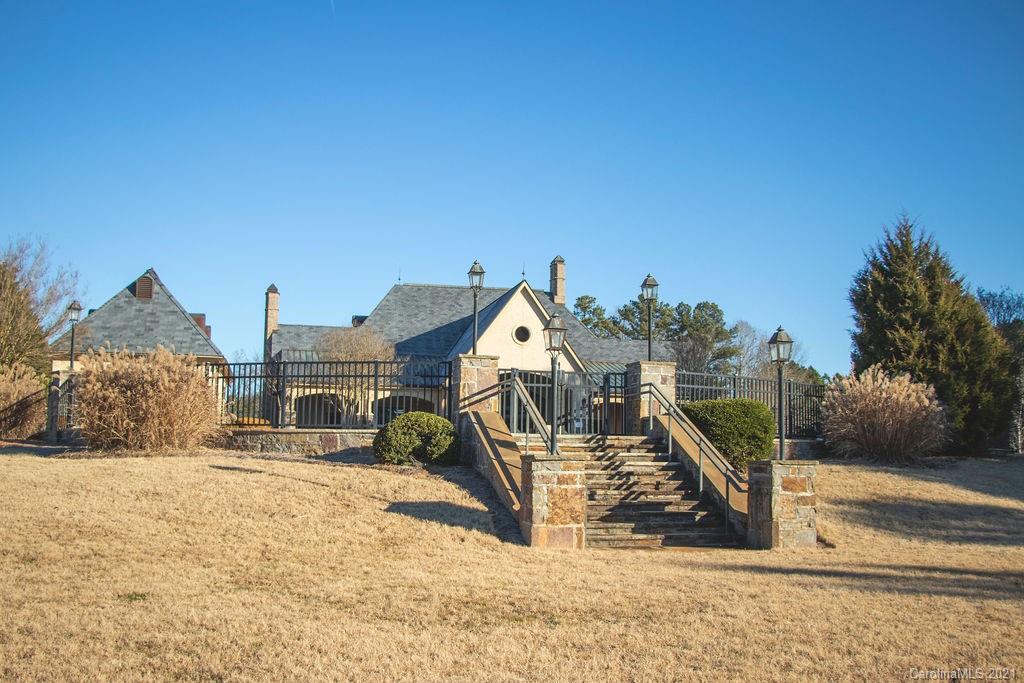 1105 Reflection Pointe Boulevard, Unit 13 Belmont, NC 28012 - Photo 24 of 25 a view of a house with a park