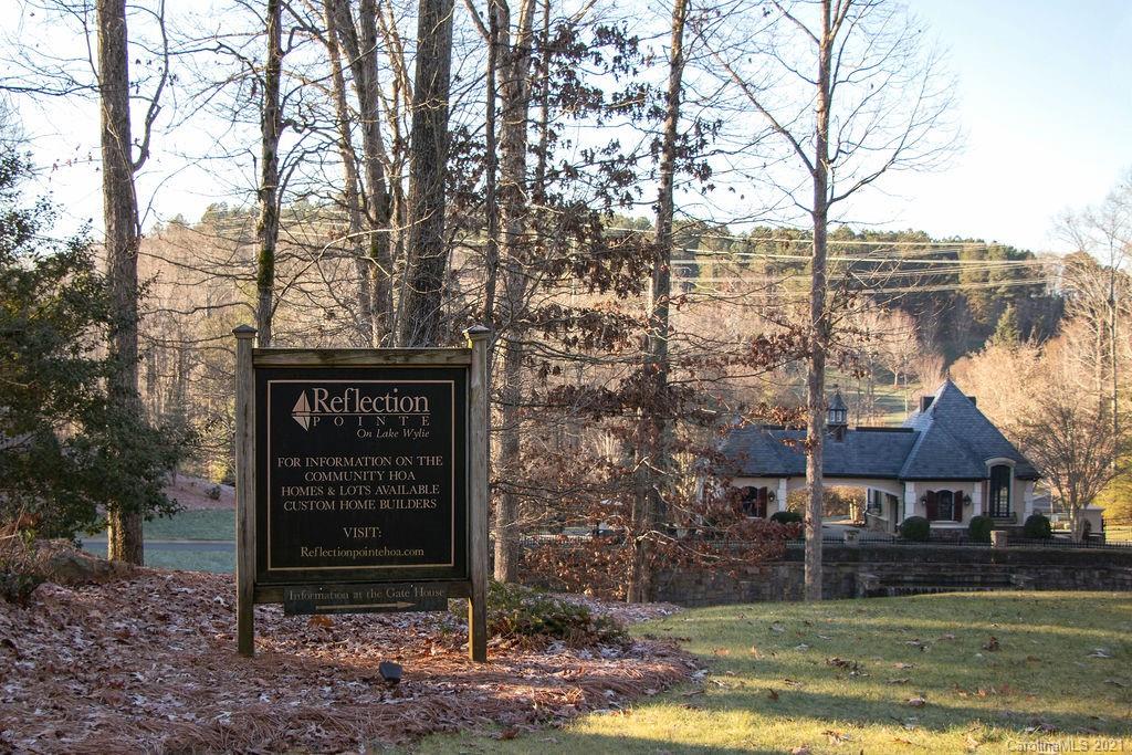 1105 Reflection Pointe Boulevard, Unit 13 Belmont, NC 28012 - Photo 7 of 25 a view of a house with a yard