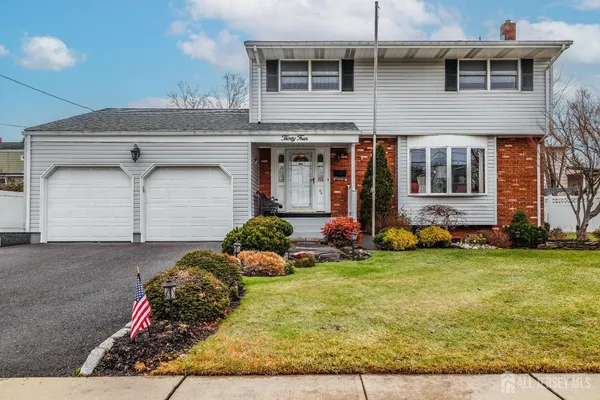 a front view of house with yard