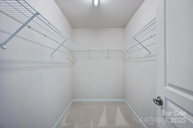 a view of a room with racks on the wall