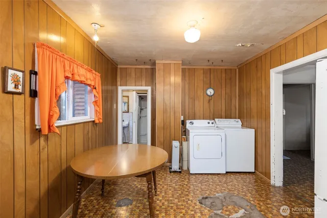 a bathroom with a sink a mirror and a shower