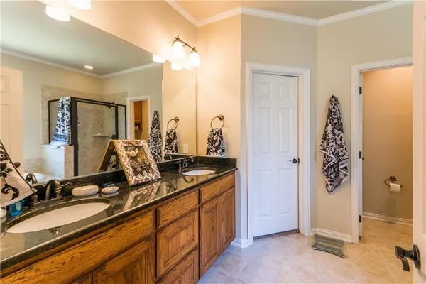a view of a bathroom with a tub and mirror