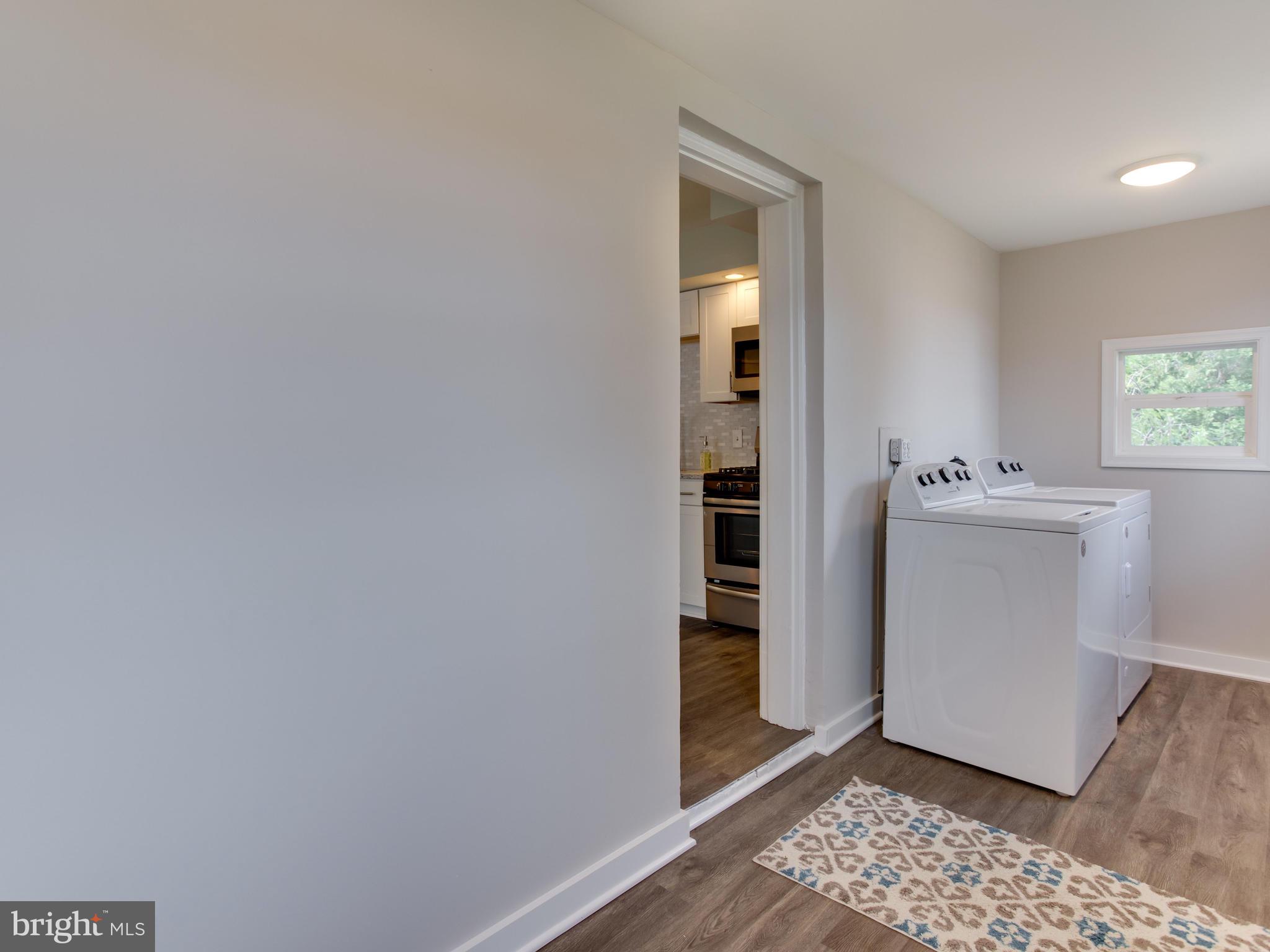 424 Holy Cross Road Baltimore, MD 21225 - Photo 20 of 39 Separate Main Floor Laundry Room