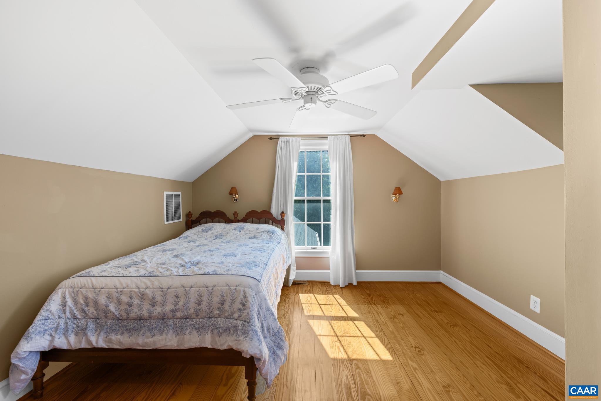 480 Dawsonville Road Barboursville, VA 22923 - Photo 42 of 55 a bedroom with a bed and a chandelier