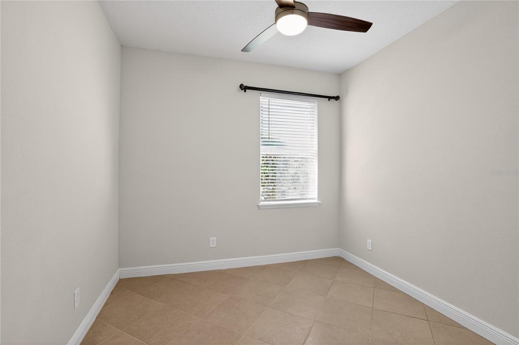 817 Dusty Pine Drive Ocoee, FL 34761 - Photo 3 of 16 an empty room with a window
