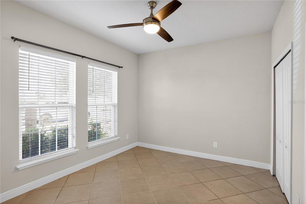 817 Dusty Pine Drive Ocoee, FL 34761 - Photo 10 of 16 a view of an empty room with a window