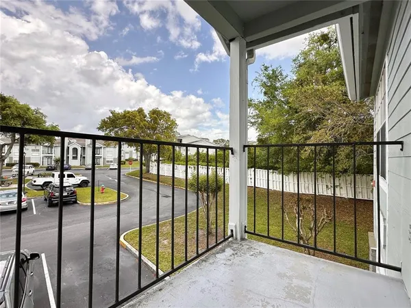a view of a house with large windows