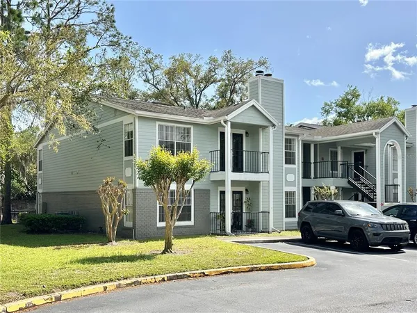 a car parked in front of a building