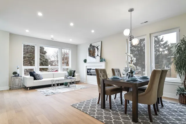 a view of a dining room with furniture window and outside view