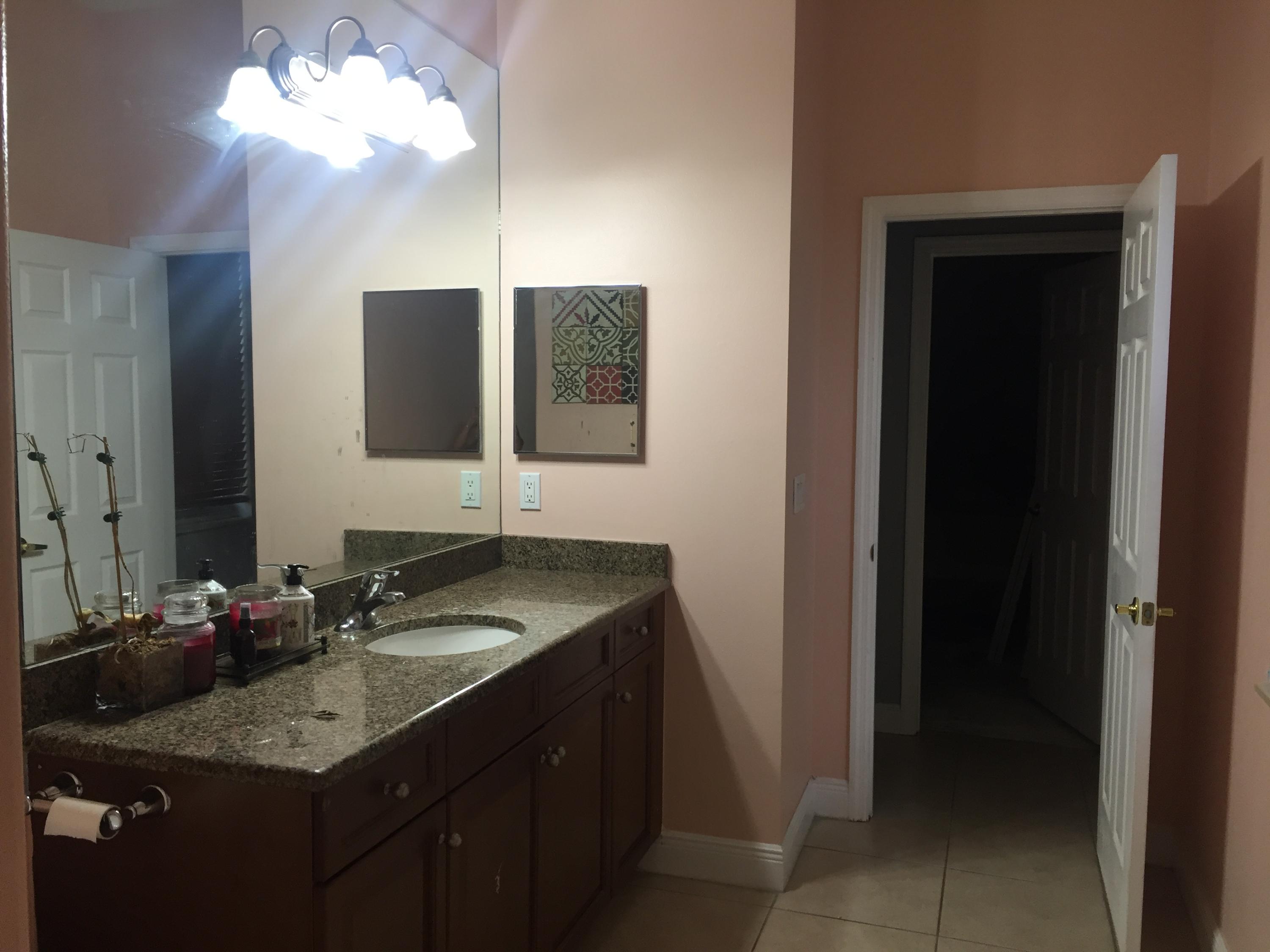 602 Southwest Dairy Road Port St. Lucie, FL 34953 - Photo 16 of 26 Bathroom 3 granite vanity