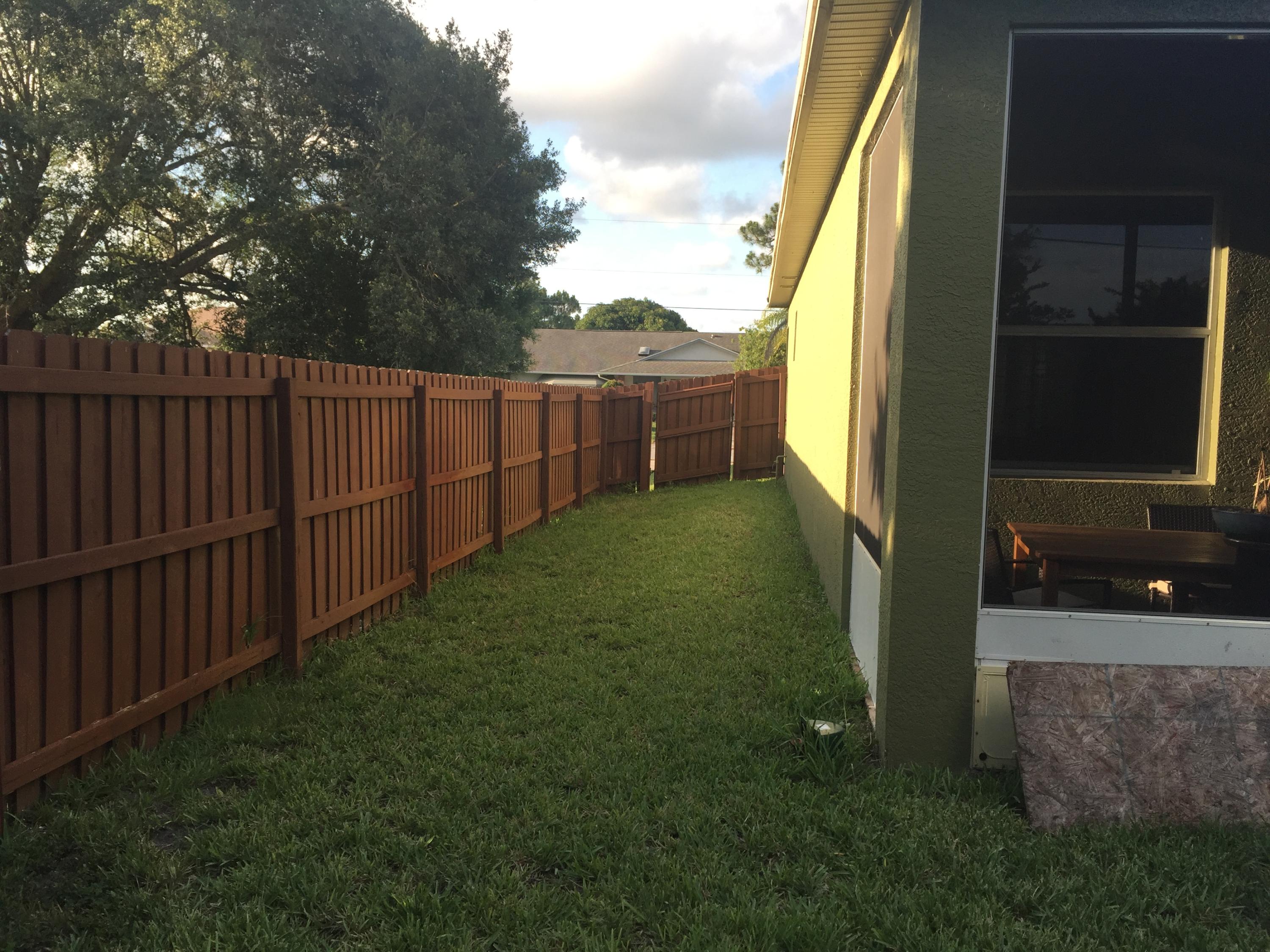 602 Southwest Dairy Road Port St. Lucie, FL 34953 - Photo 20 of 26 Backyard Side