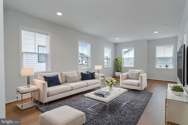 a living room with furniture and a couch