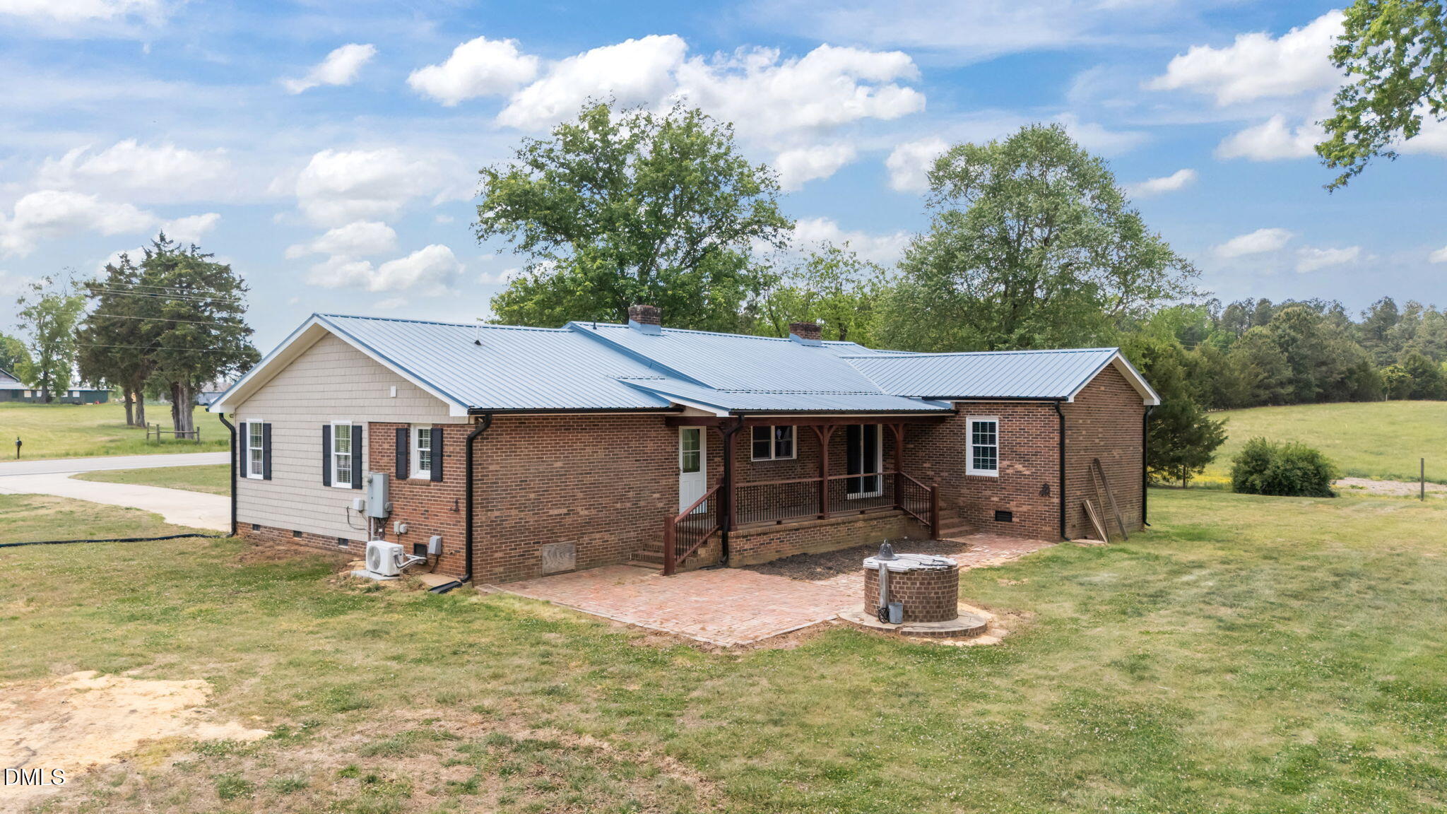 3611 Chewning Road Oxford, NC 27565 - Photo 12 of 45 a view of a house with backyard and garden