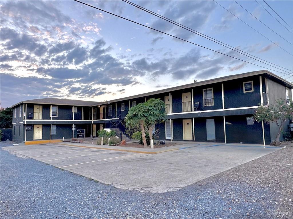 a front view of a house with large windows
