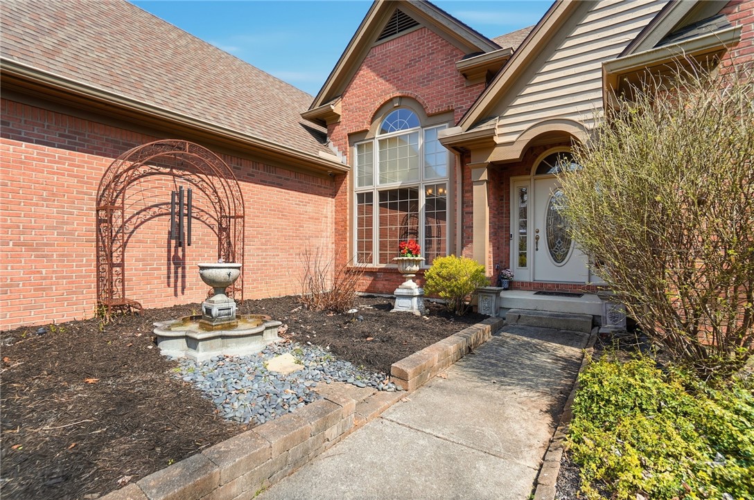 472 Timber Walk Court Springboro, OH 45066 - Photo 59 of 86 This classic brick residence features an inviting arched entryway and a charming front yard fountain.