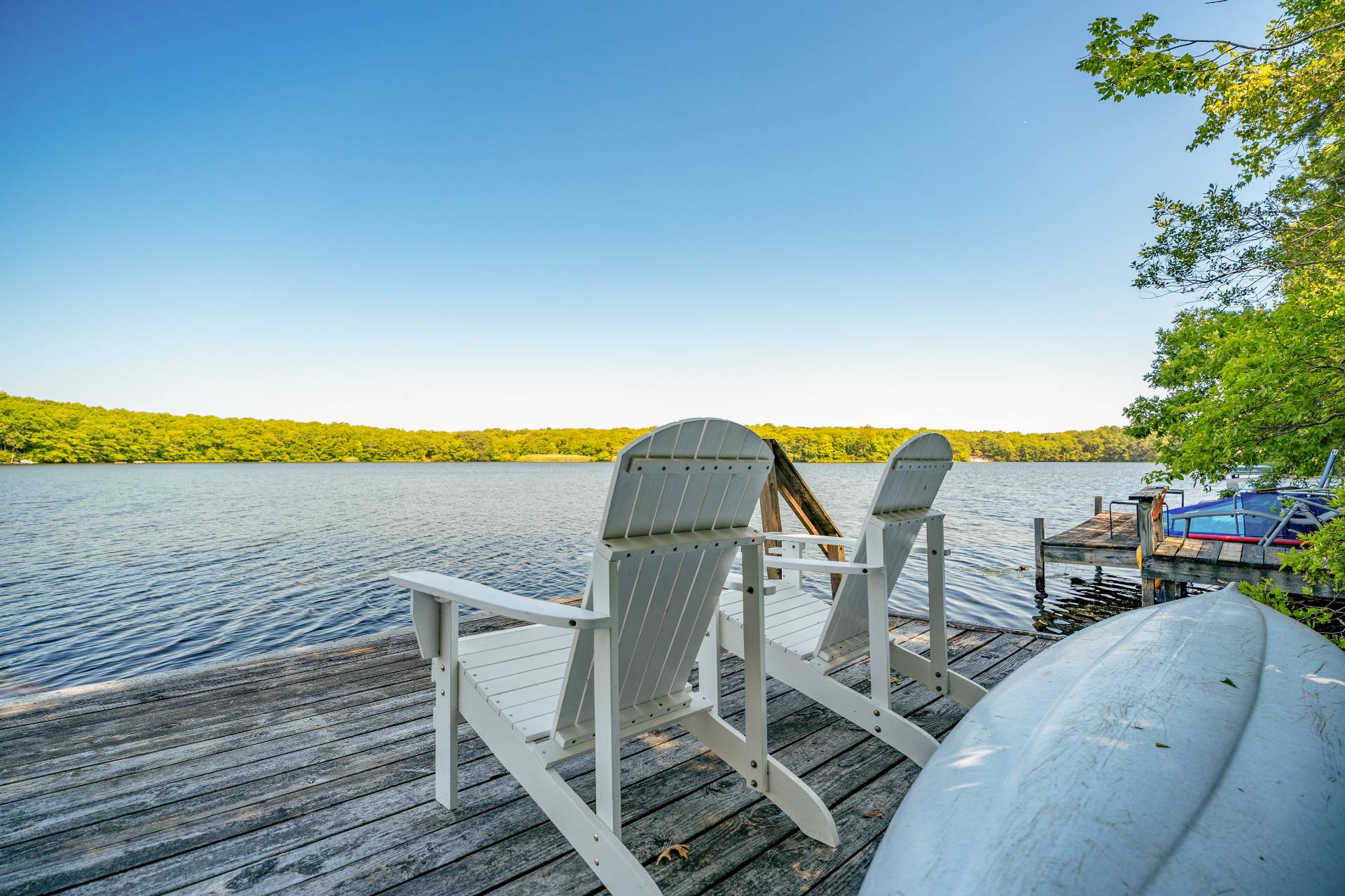 a view of a swimming pool with lounge chairs