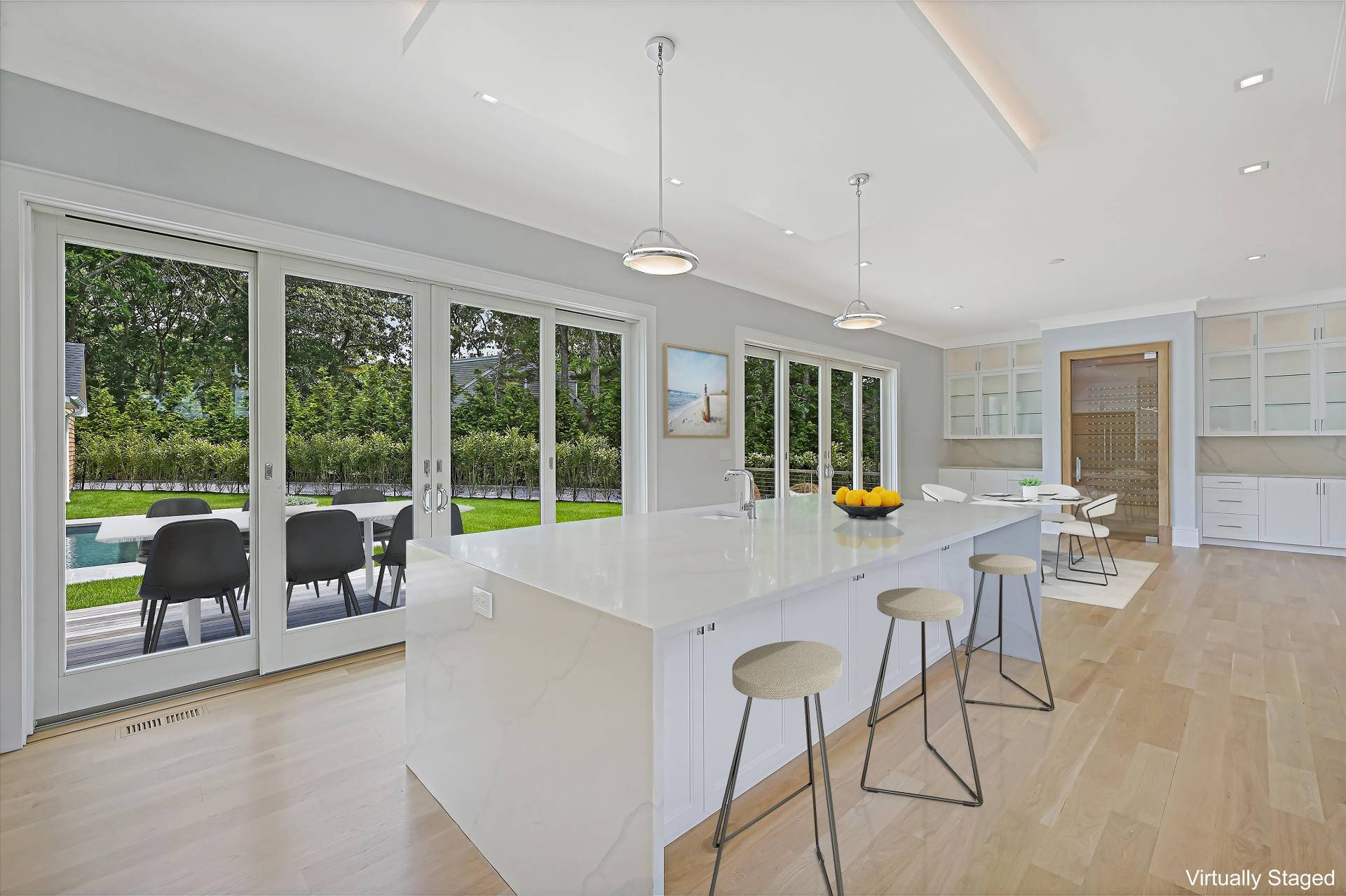 138 Big Fresh Pond Road Southampton, NY 11968 - Photo 16 of 43 a view of a dining room with furniture window and outside view
