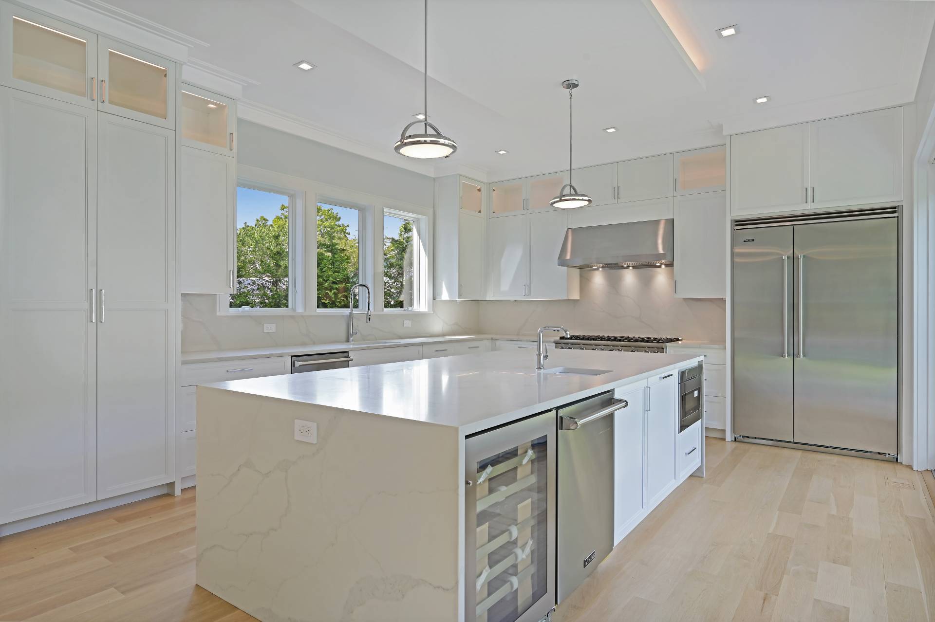 138 Big Fresh Pond Road Southampton, NY 11968 - Photo 20 of 43 a kitchen with a sink stove and refrigerator