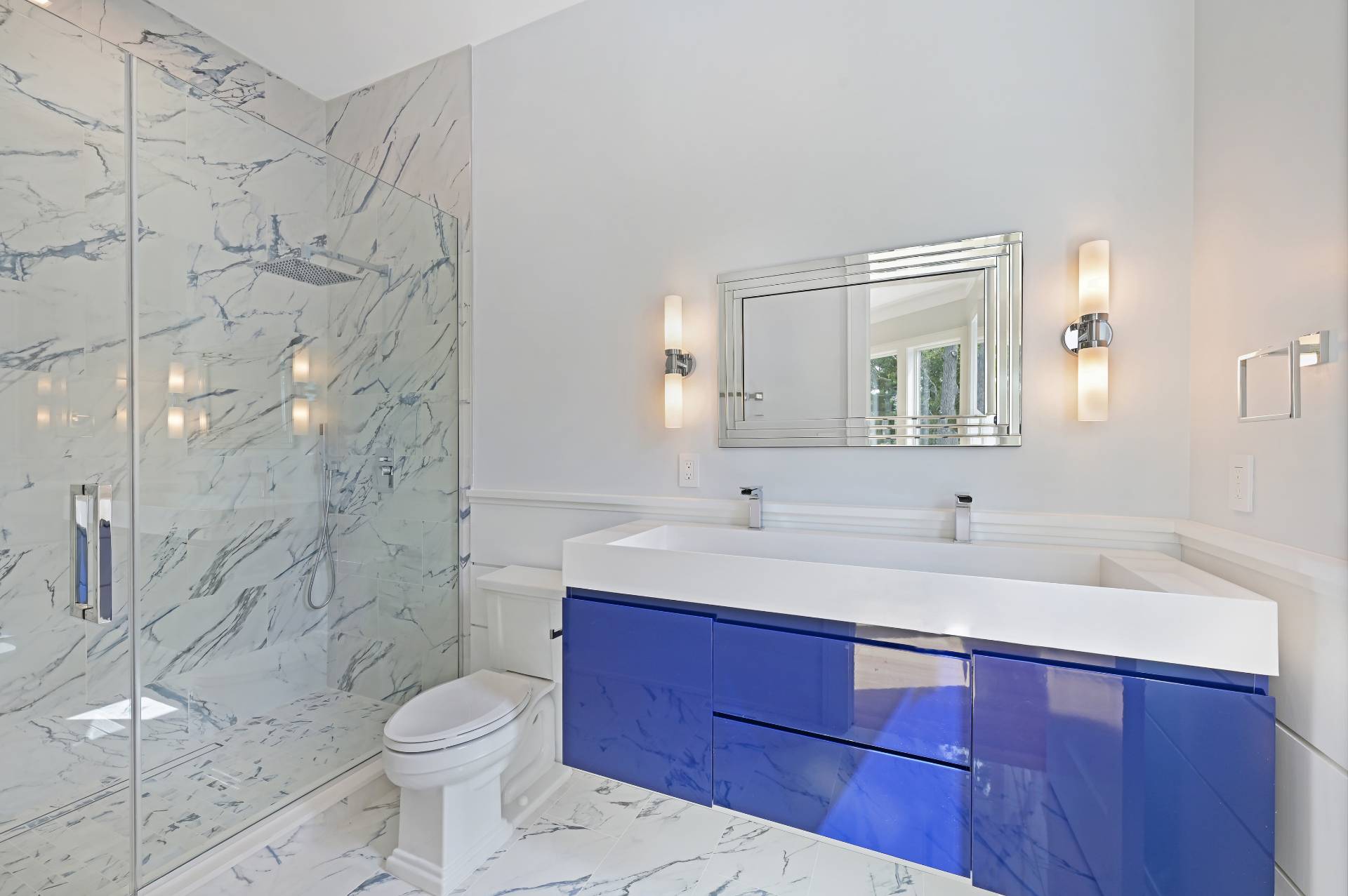 138 Big Fresh Pond Road Southampton, NY 11968 - Photo 22 of 43 a bathroom with a sink a toilet and shower