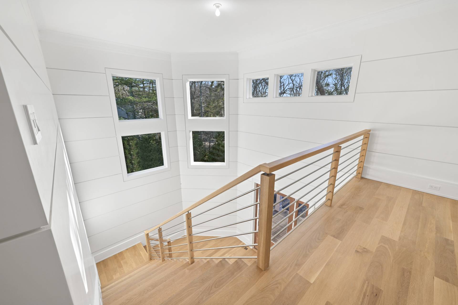 138 Big Fresh Pond Road Southampton, NY 11968 - Photo 23 of 43 a view of entryway with wooden floor and windows