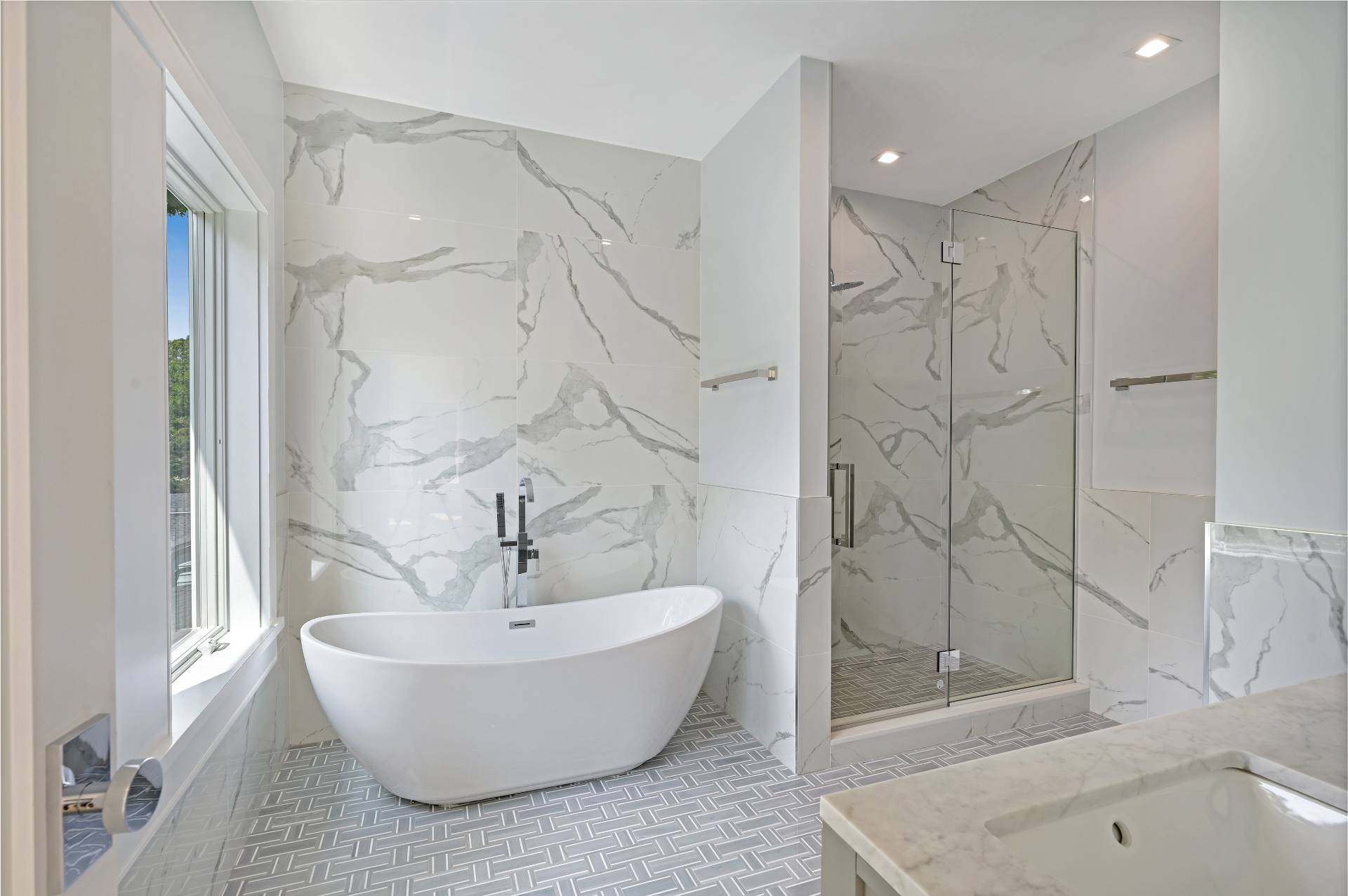 138 Big Fresh Pond Road Southampton, NY 11968 - Photo 27 of 43 a white bath tub sitting next to a white sink