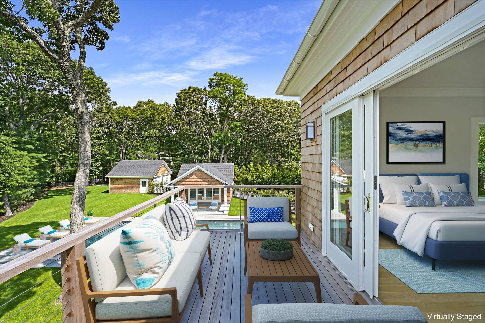 138 Big Fresh Pond Road Southampton, NY 11968 - Photo 30 of 43 a balcony with table and chairs