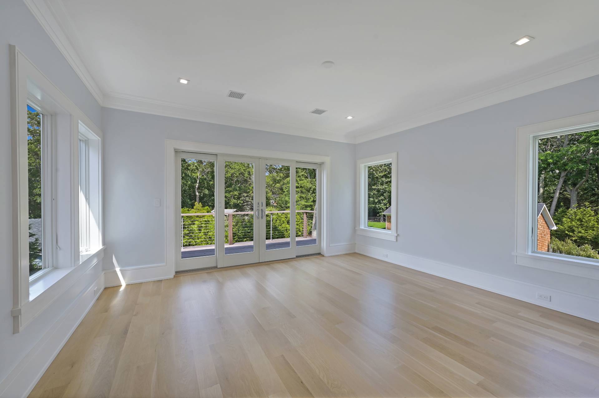 138 Big Fresh Pond Road Southampton, NY 11968 - Photo 31 of 43 a view of room with window and hardwood floor