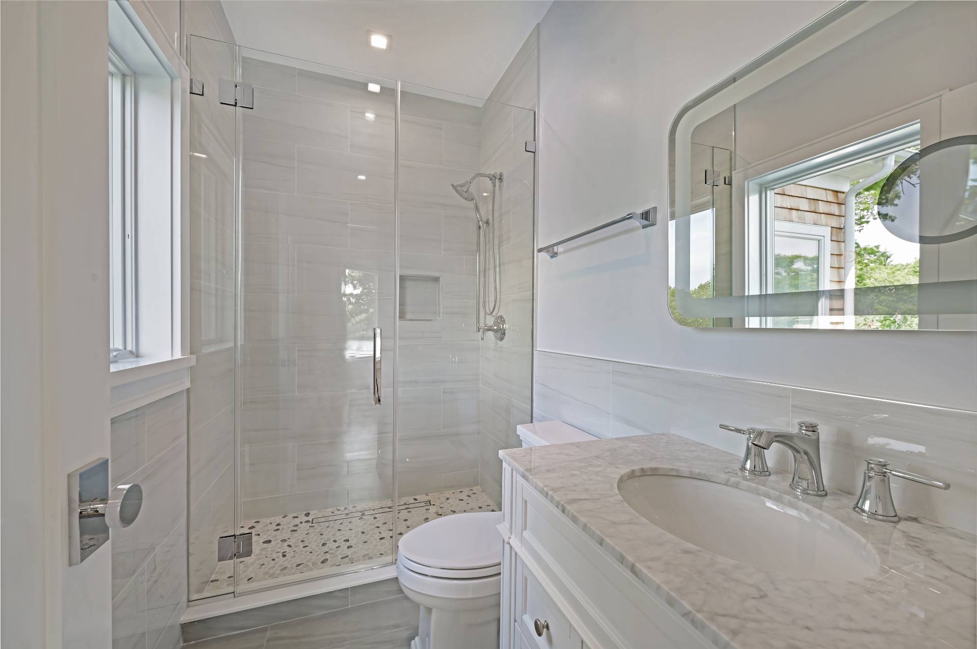 138 Big Fresh Pond Road Southampton, NY 11968 - Photo 32 of 43 a bathroom with a granite countertop sink toilet and shower