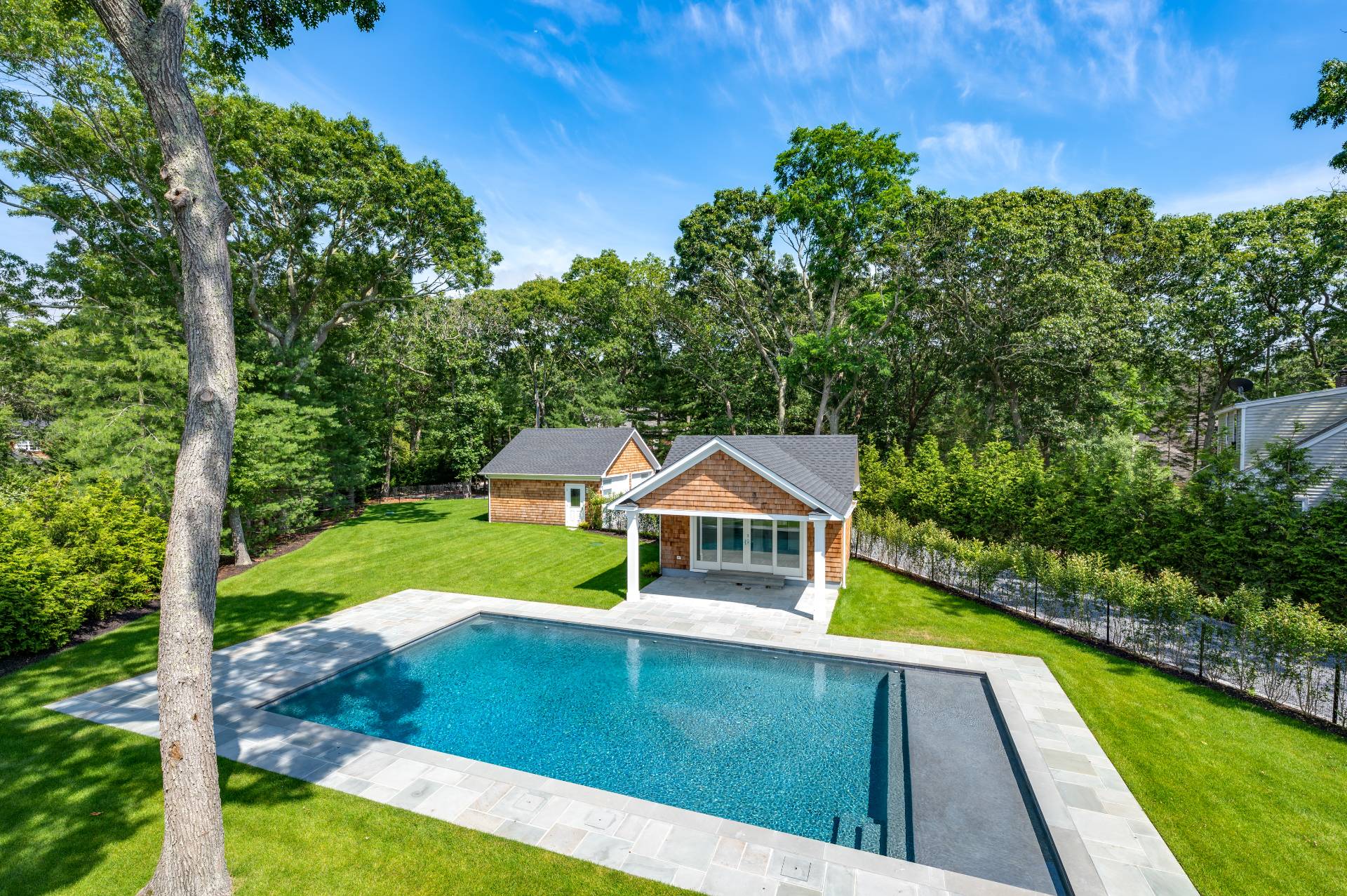 138 Big Fresh Pond Road Southampton, NY 11968 - Photo 37 of 43 a view of a house with pool