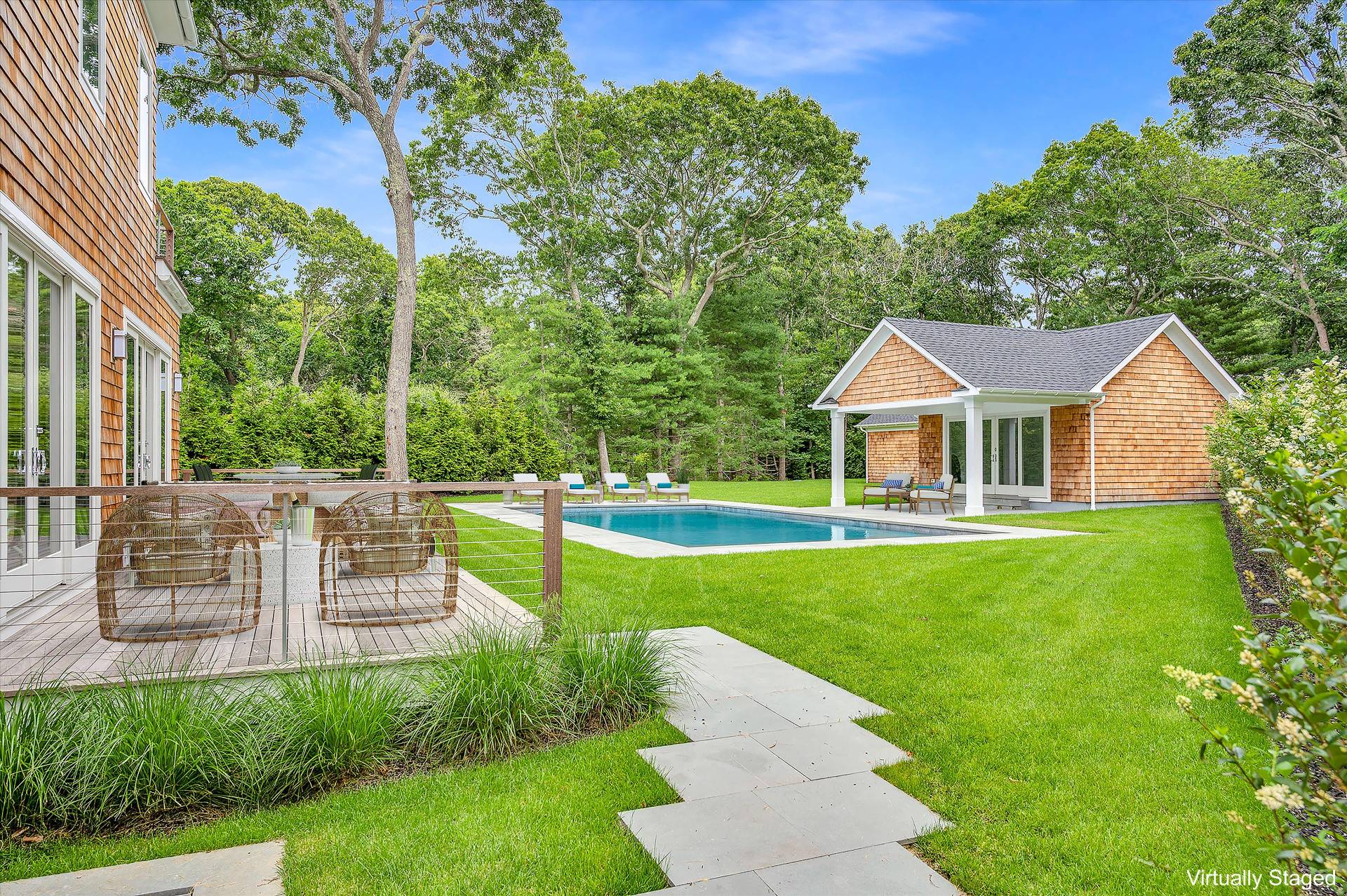 138 Big Fresh Pond Road Southampton, NY 11968 - Photo 38 of 43 a view of house with a yard
