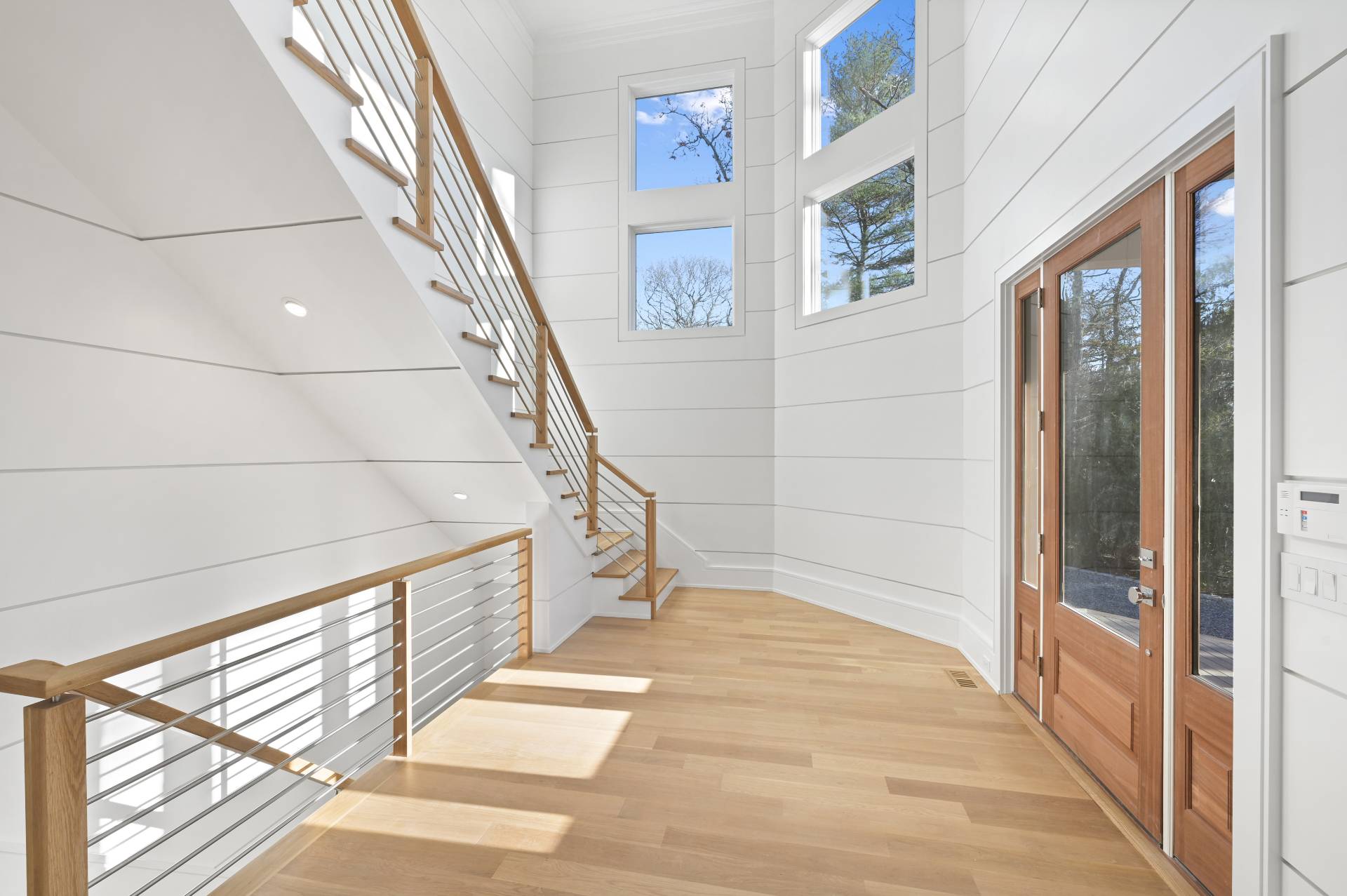 138 Big Fresh Pond Road Southampton, NY 11968 - Photo 7 of 43 a view of entryway and hall with wooden floor