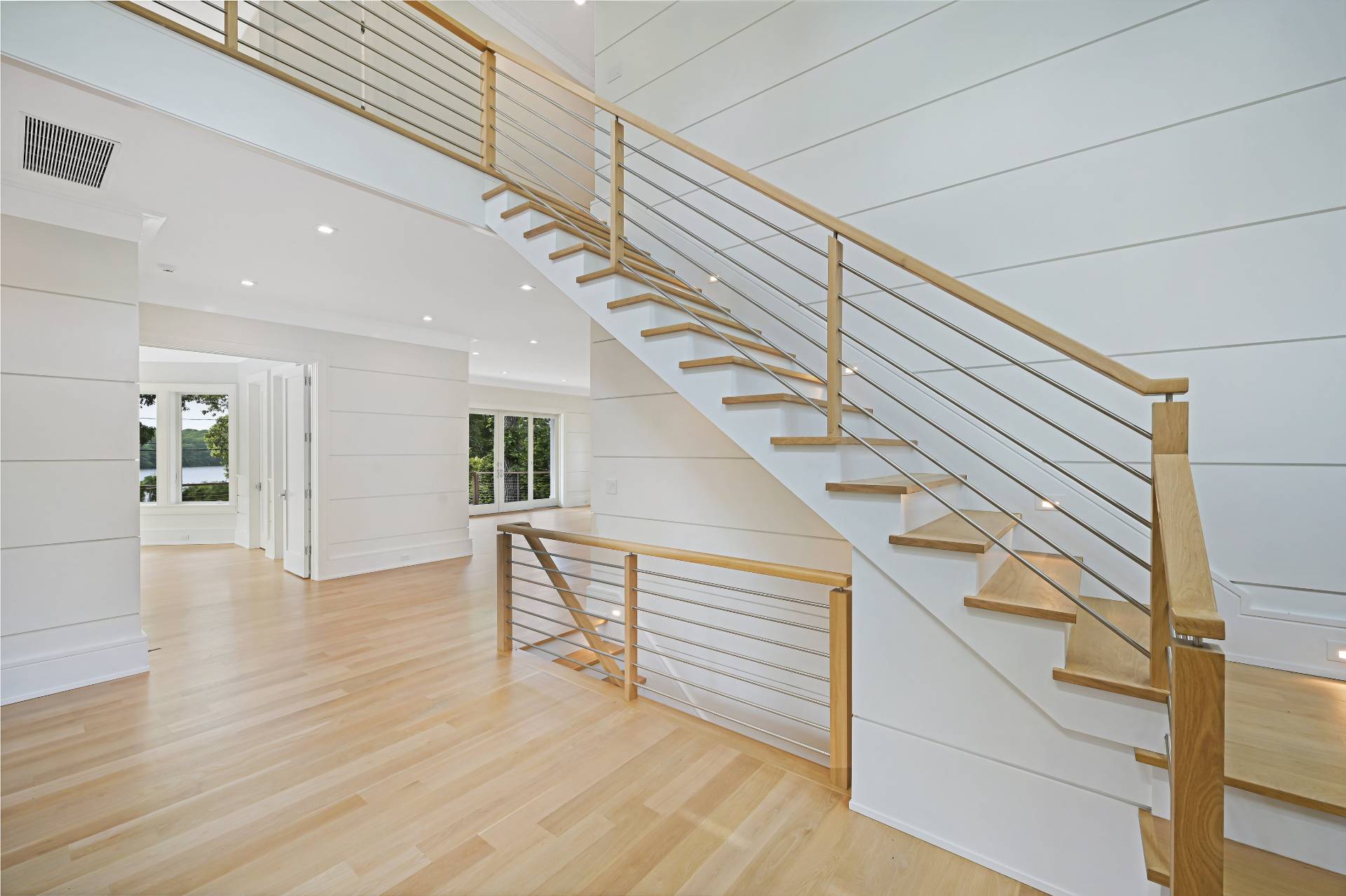 138 Big Fresh Pond Road Southampton, NY 11968 - Photo 8 of 43 a view of entryway and hall with wooden floor