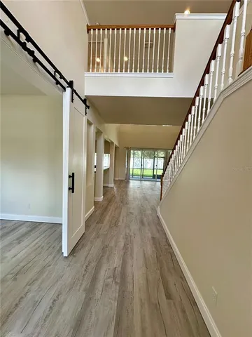 a view of entryway with wooden floor