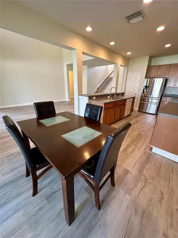 a view of a dining room with furniture