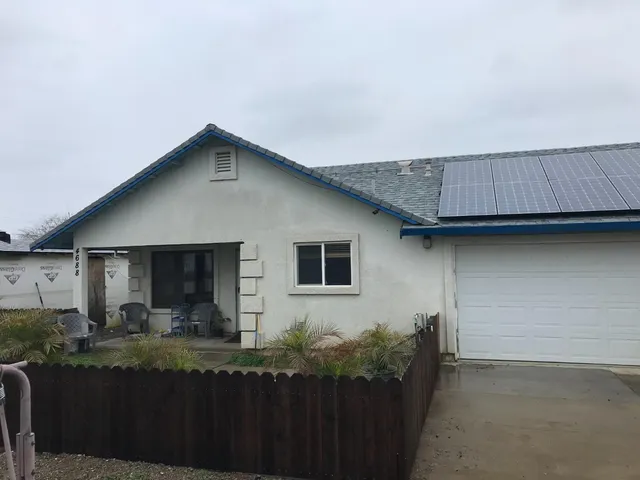 a house view with a outdoor space