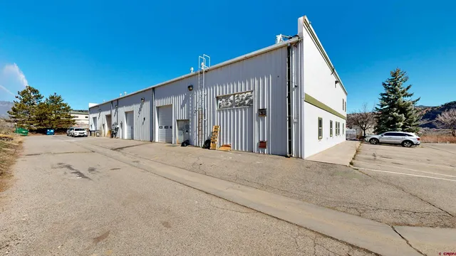 a view of a house with a street