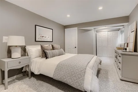 a bedroom with a bed and a view of bathroom