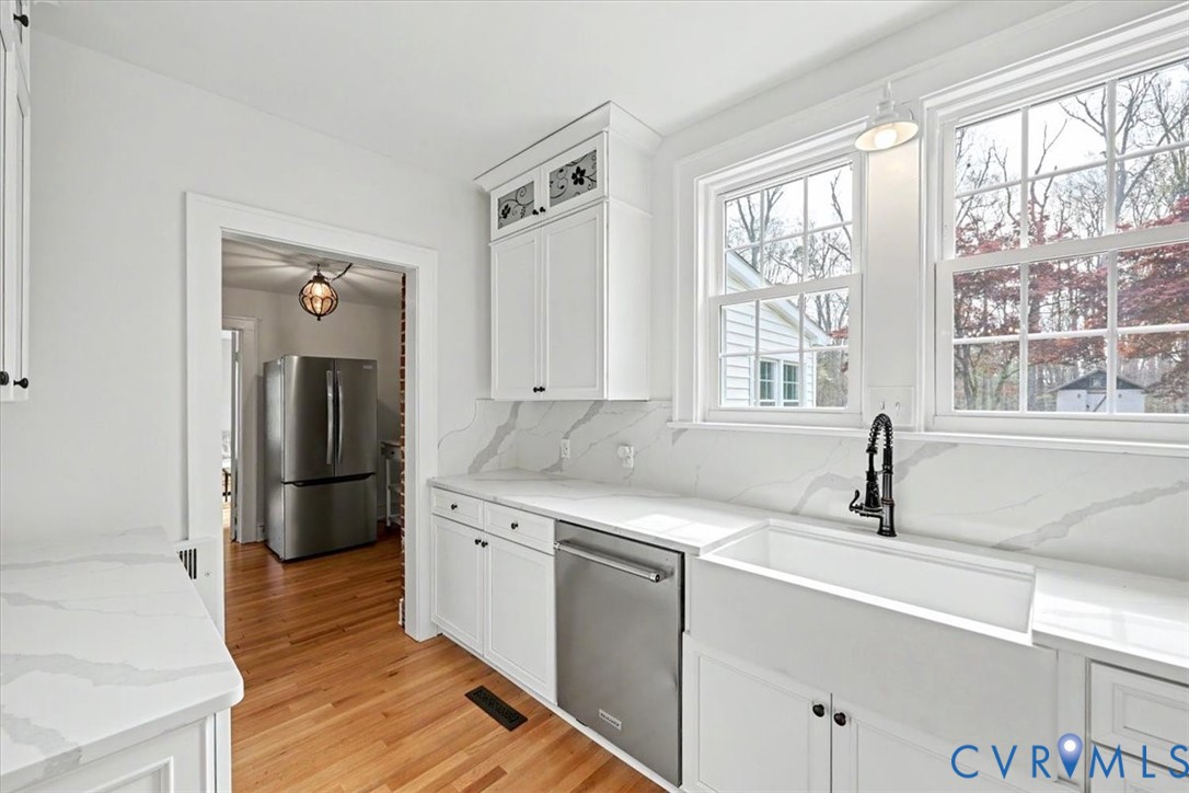 2800 Nottoway Boulevard Victoria, VA 23974 - Photo 13 of 45 Kitchen featuring white cabinetry, stainless steel