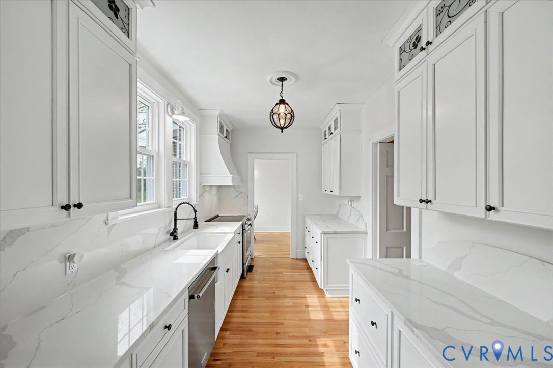 2800 Nottoway Boulevard Victoria, VA 23974 - Photo 15 of 45 Kitchen featuring glass insert cabinets, light sto