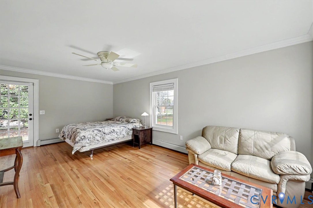 2800 Nottoway Boulevard Victoria, VA 23974 - Photo 25 of 45 Bedroom featuring crown molding, light wood-style