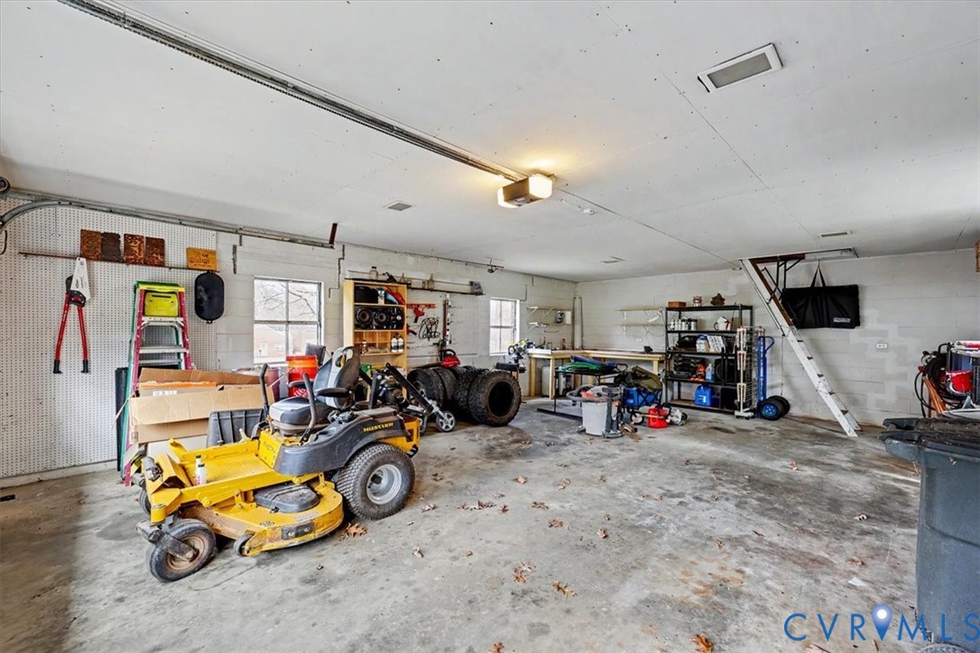 2800 Nottoway Boulevard Victoria, VA 23974 - Photo 45 of 45 Garage with concrete block wall and a garage door