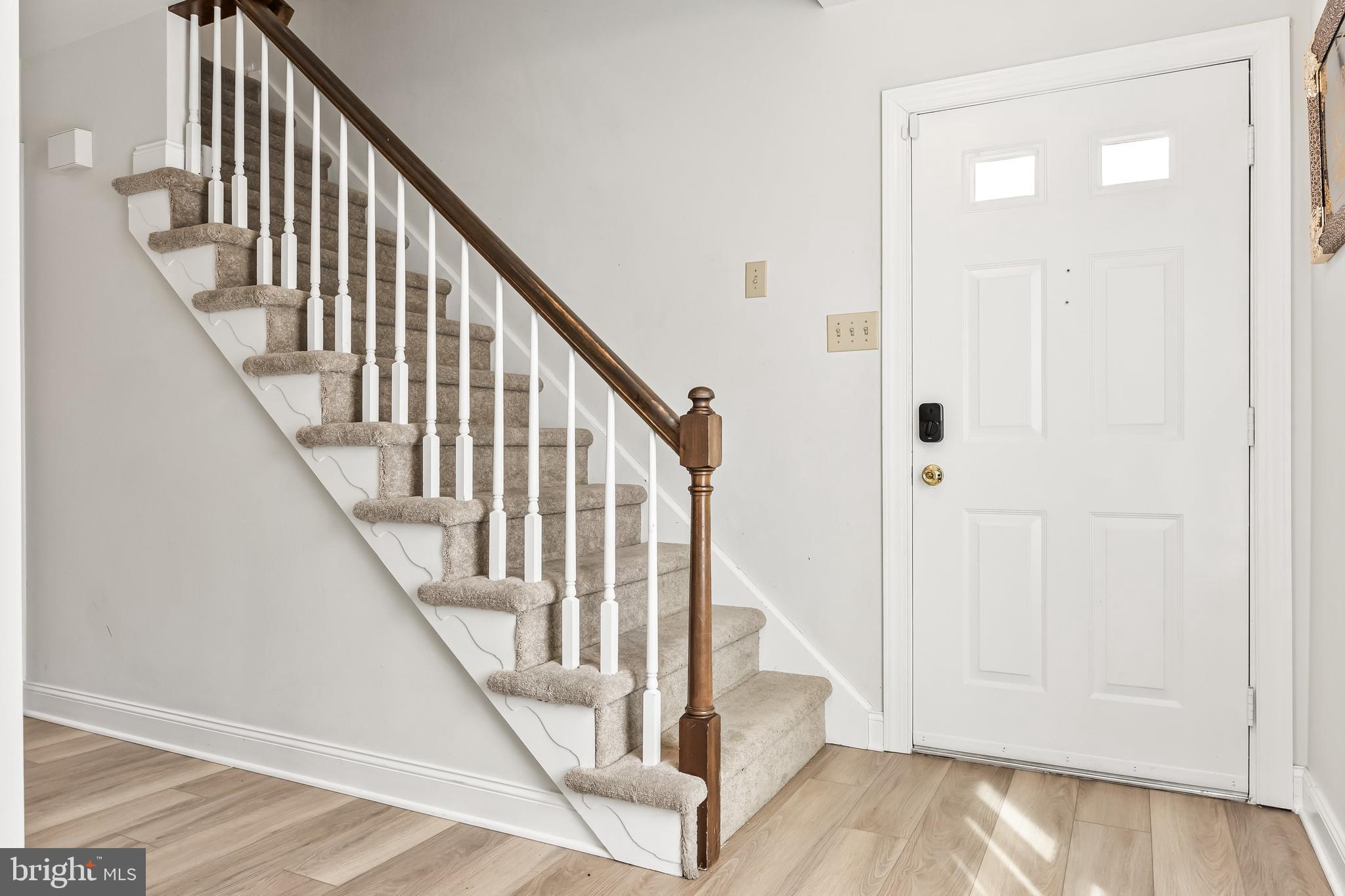 14 Taunton Road Medford, NJ 08055 - Photo 11 of 47 a view of staircase with wooden floor and white walls
