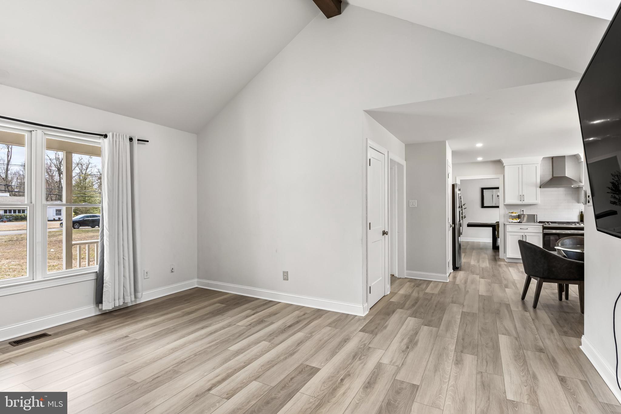 14 Taunton Road Medford, NJ 08055 - Photo 26 of 47 a view of a living room hardwood floor and a kitchen